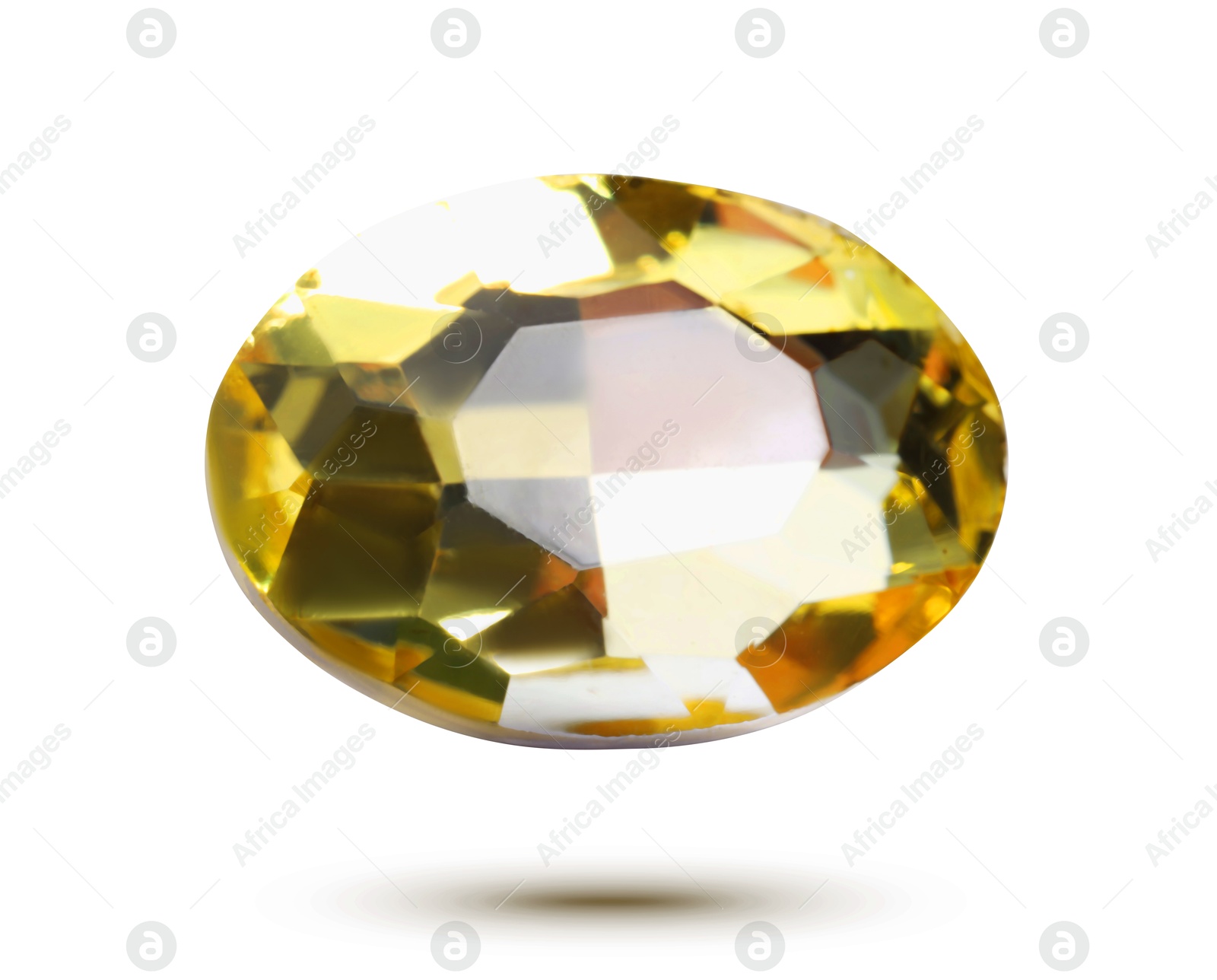 Image of Yellow shiny gemstone in air on white background