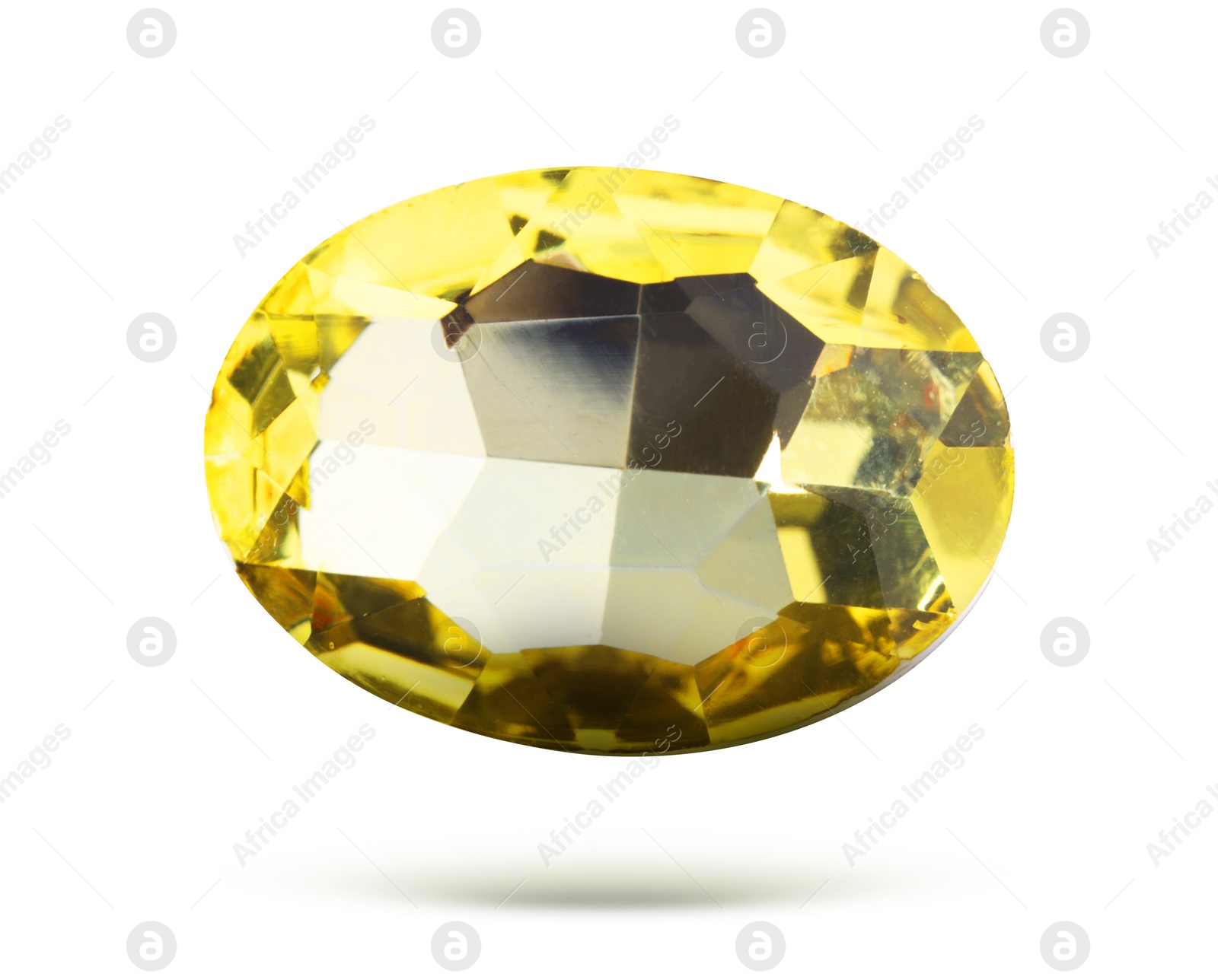 Image of Yellow shiny gemstone in air on white background