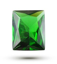 Image of One green shiny gemstone in air on white background