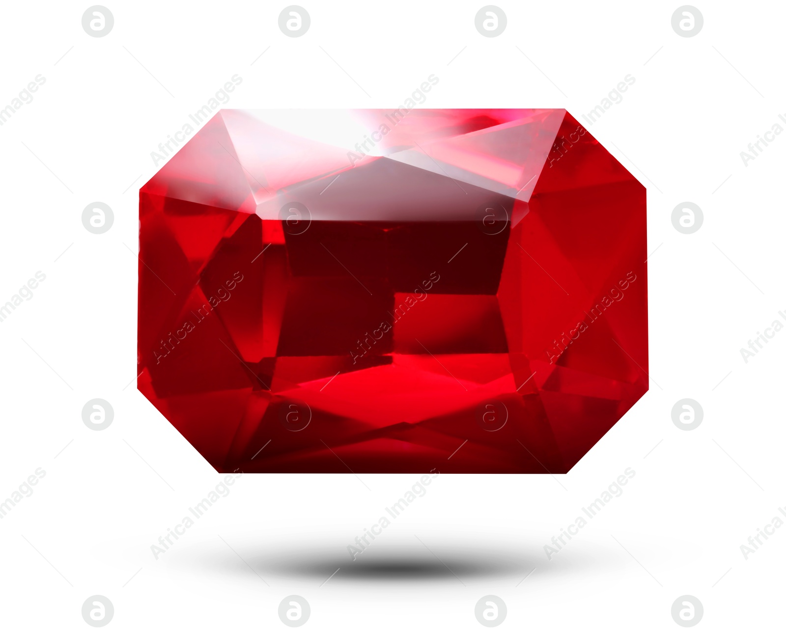 Image of Red shiny gemstone in air on white background