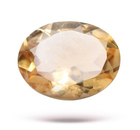 Image of Yellow-orange shiny gemstone in air on white background