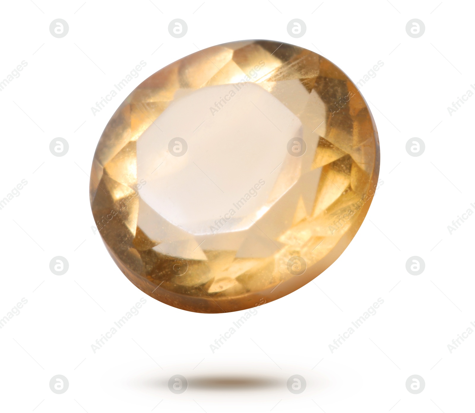 Image of Yellow-orange shiny gemstone in air on white background