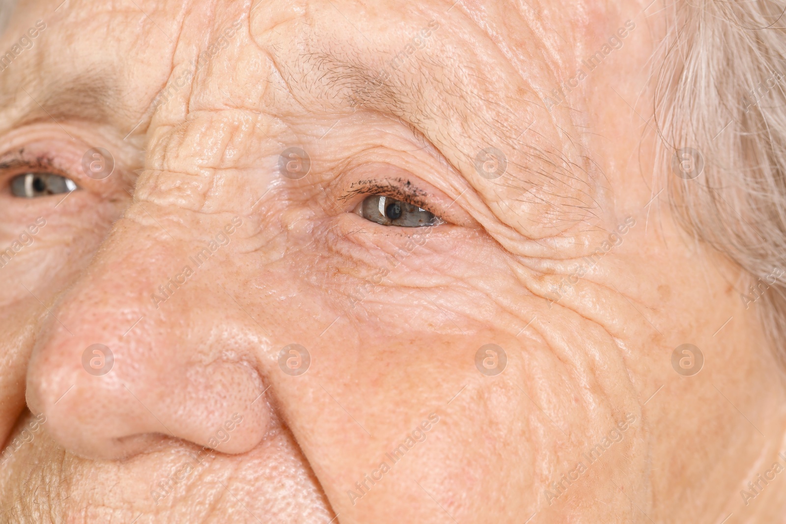 Photo of Senior woman with beautiful eyes, macro view