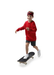 Photo of Little boy with skateboard on white background