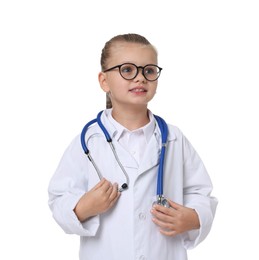 Photo of Little girl with stethoscope pretending to be doctor on white background. Dreaming of future profession