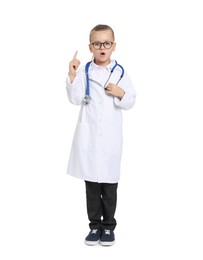 Little girl with stethoscope pretending to be doctor on white background. Dreaming of future profession