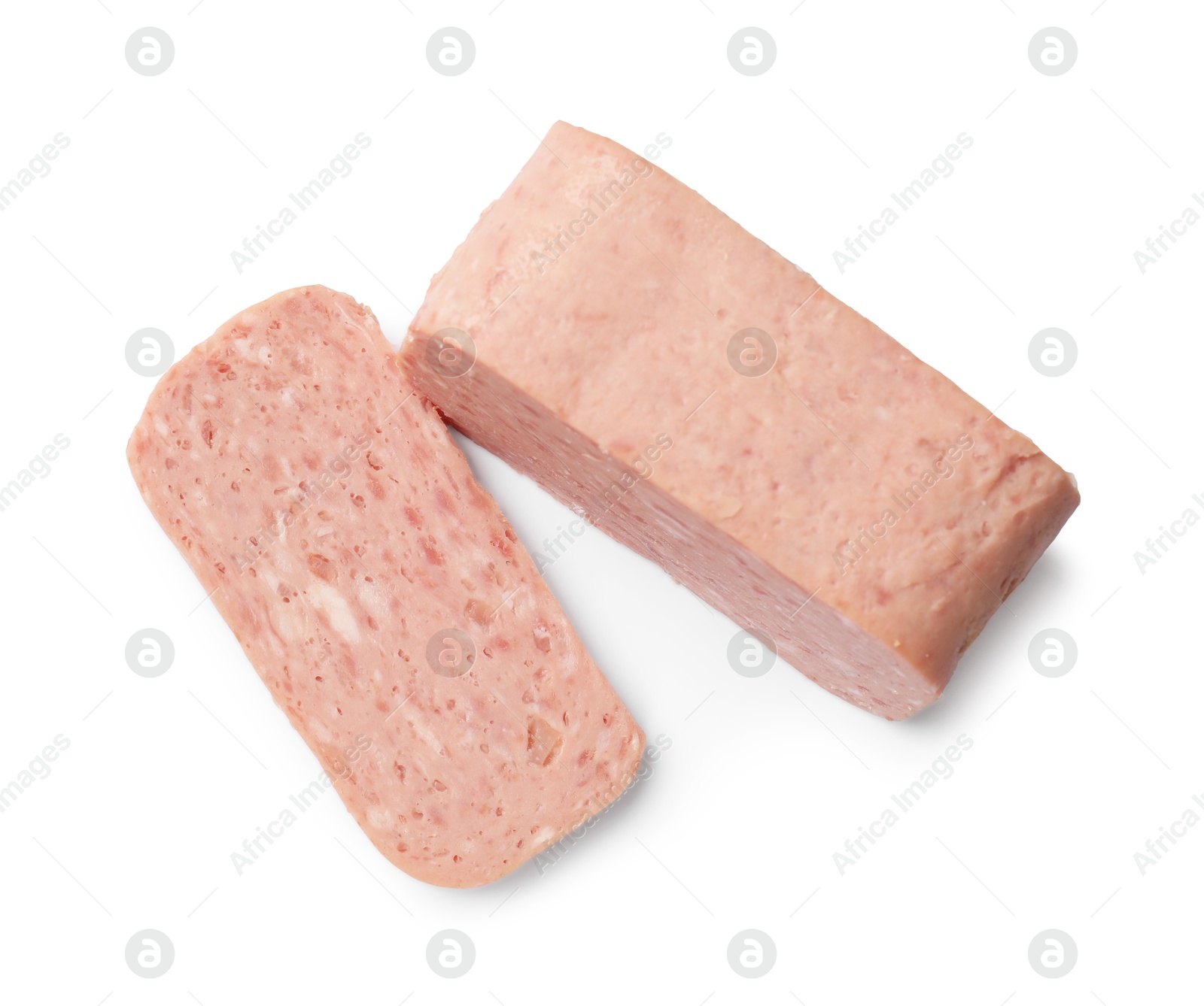 Photo of Pieces of canned meat isolated on white, top view