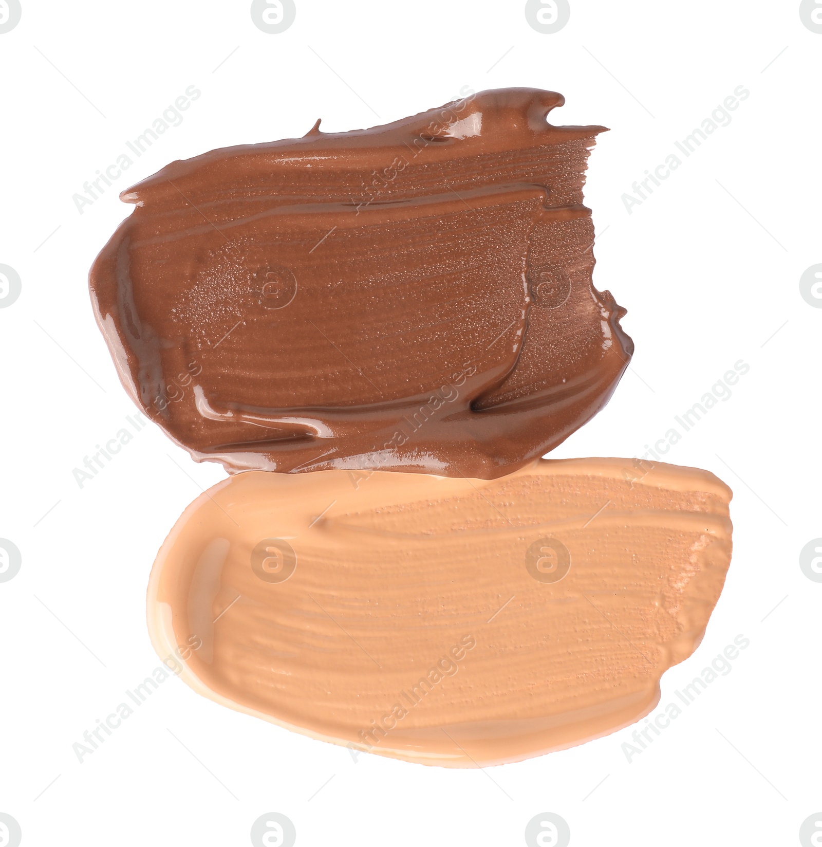 Photo of Samples of different foundation isolated on white, top view