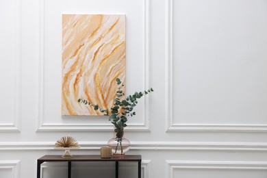 Photo of Console table with decor near white wall in room, space for text. Interior design