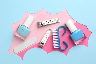 Photo of Set of pedicure tools on color background, flat lay