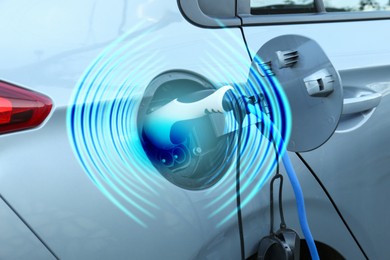 Image of Charging modern electric car from station outdoors. Round pulse waves representing energy