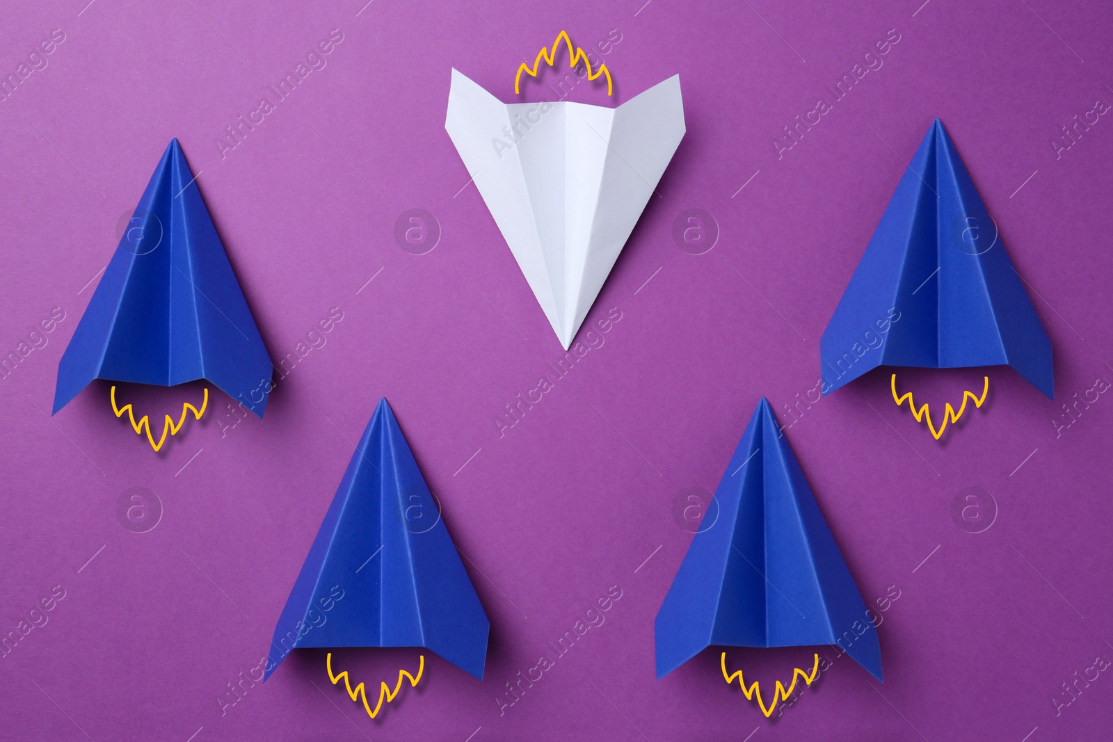 Image of White paper plane flying towards blue ones on purple background