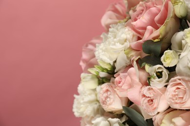 Beautiful bouquet on pink background, closeup. Space for text