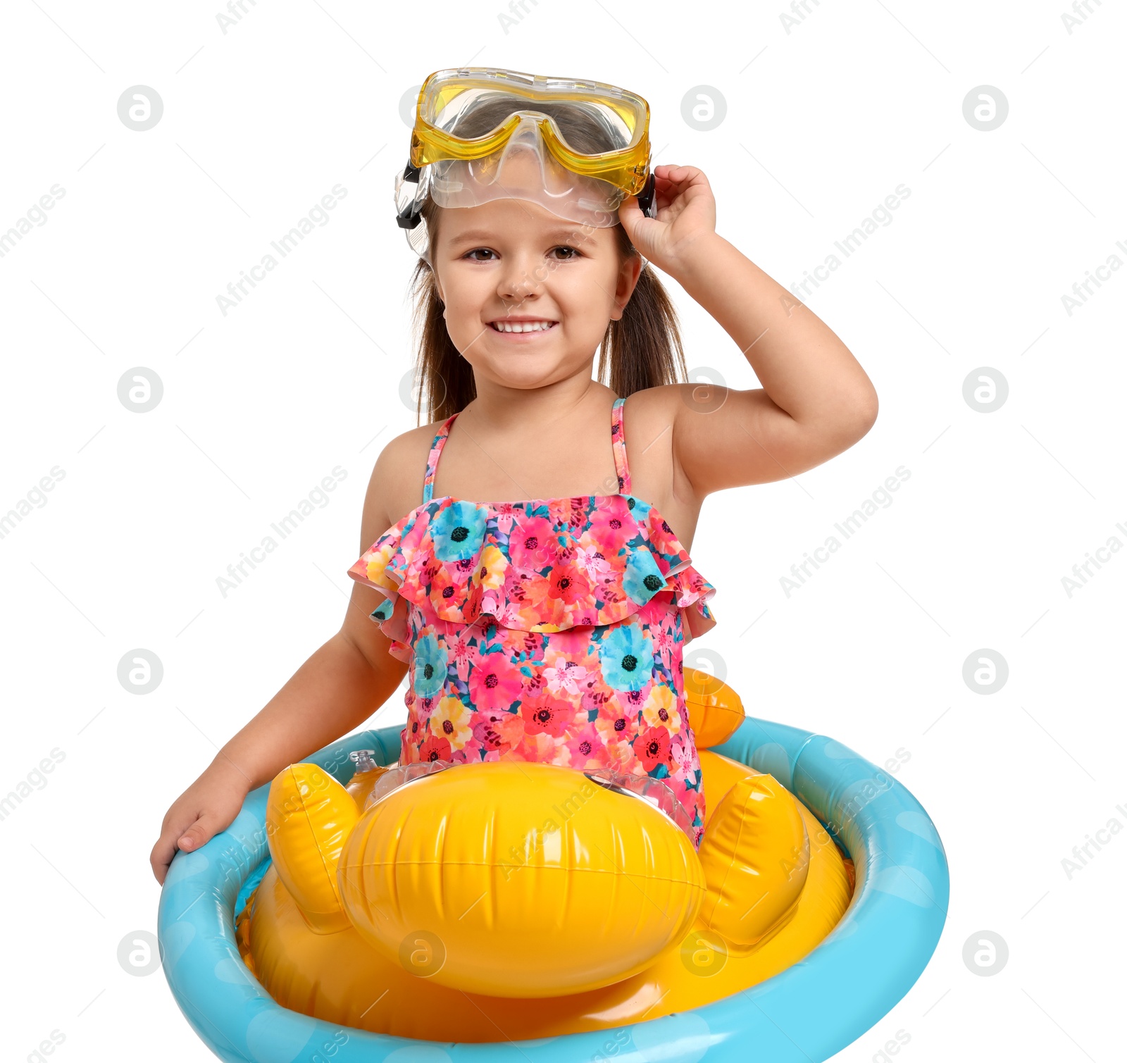 Photo of Cute little girl in swimsuit with inflatable ring on white background