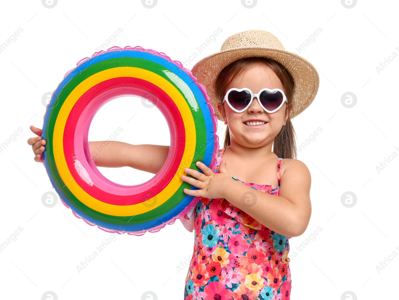 Photo of Cute little girl in swimsuit with straw hat and inflatable ring on white background