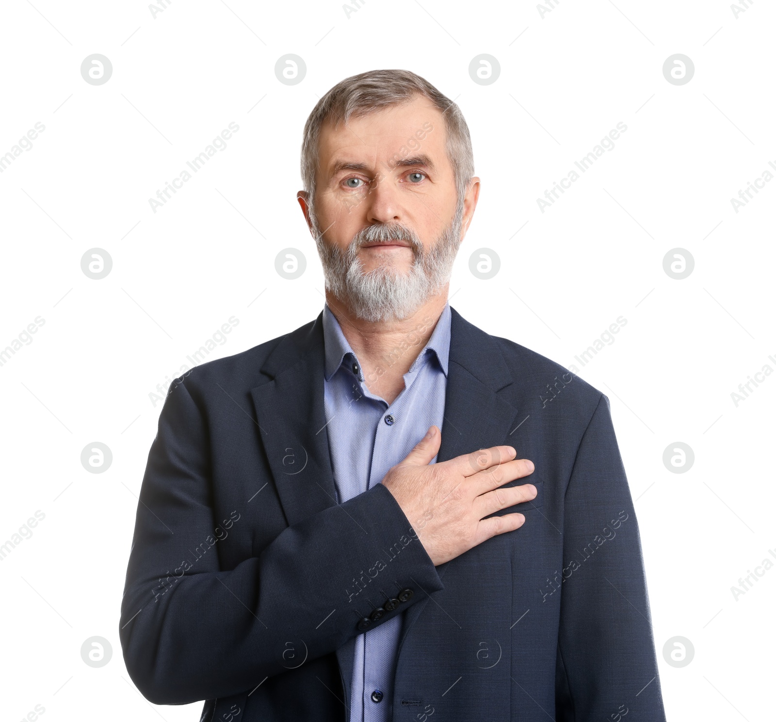 Photo of Mature man making promise on white background. Oath gesture