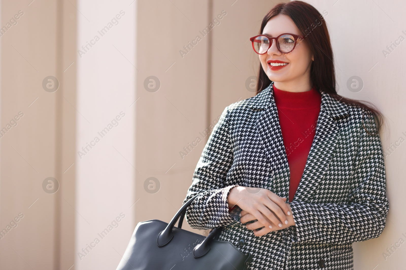 Photo of Smiling businesswoman in stylish suit outdoors on sunny day. Space for text