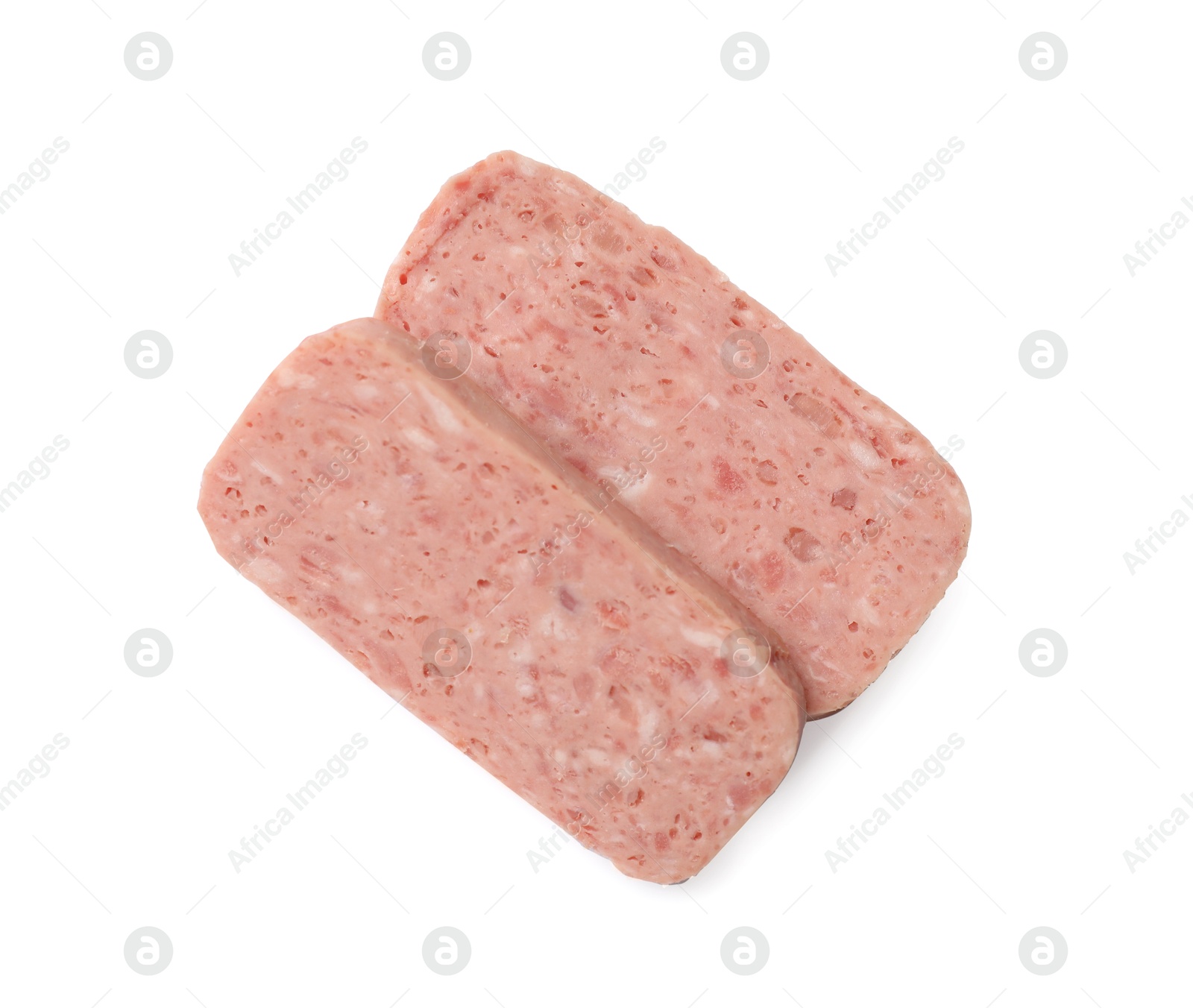 Photo of Pieces of canned meat isolated on white, top view