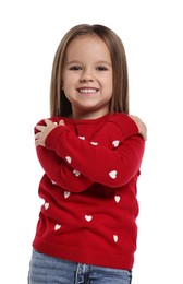 Photo of Cute little girl hugging herself on white background