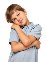 Photo of Cute little boy hugging himself on white background