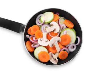 Photo of Frying pan with mix of fresh vegetables and mushrooms isolated on white, top view