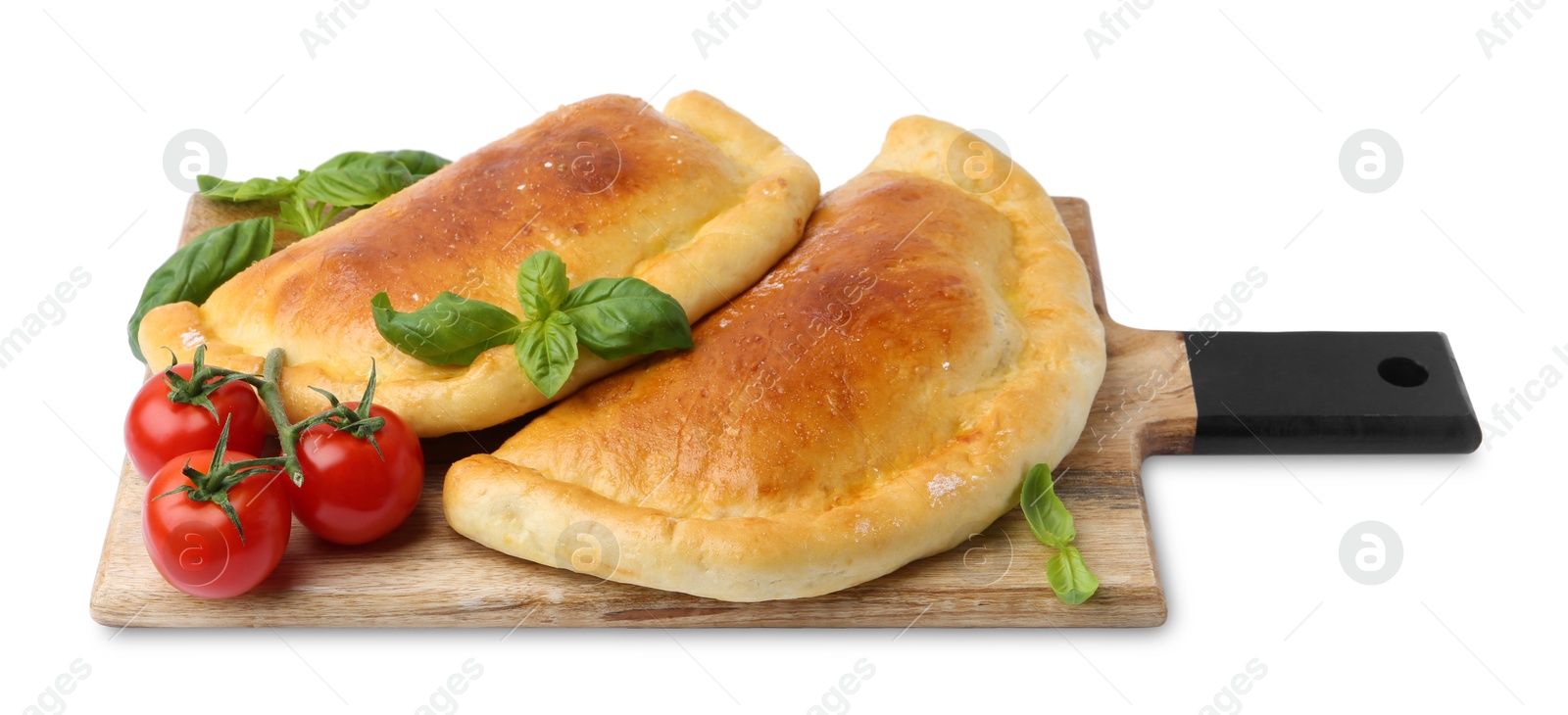 Photo of Tasty vegetarian calzones with basil and tomatoes isolated on white