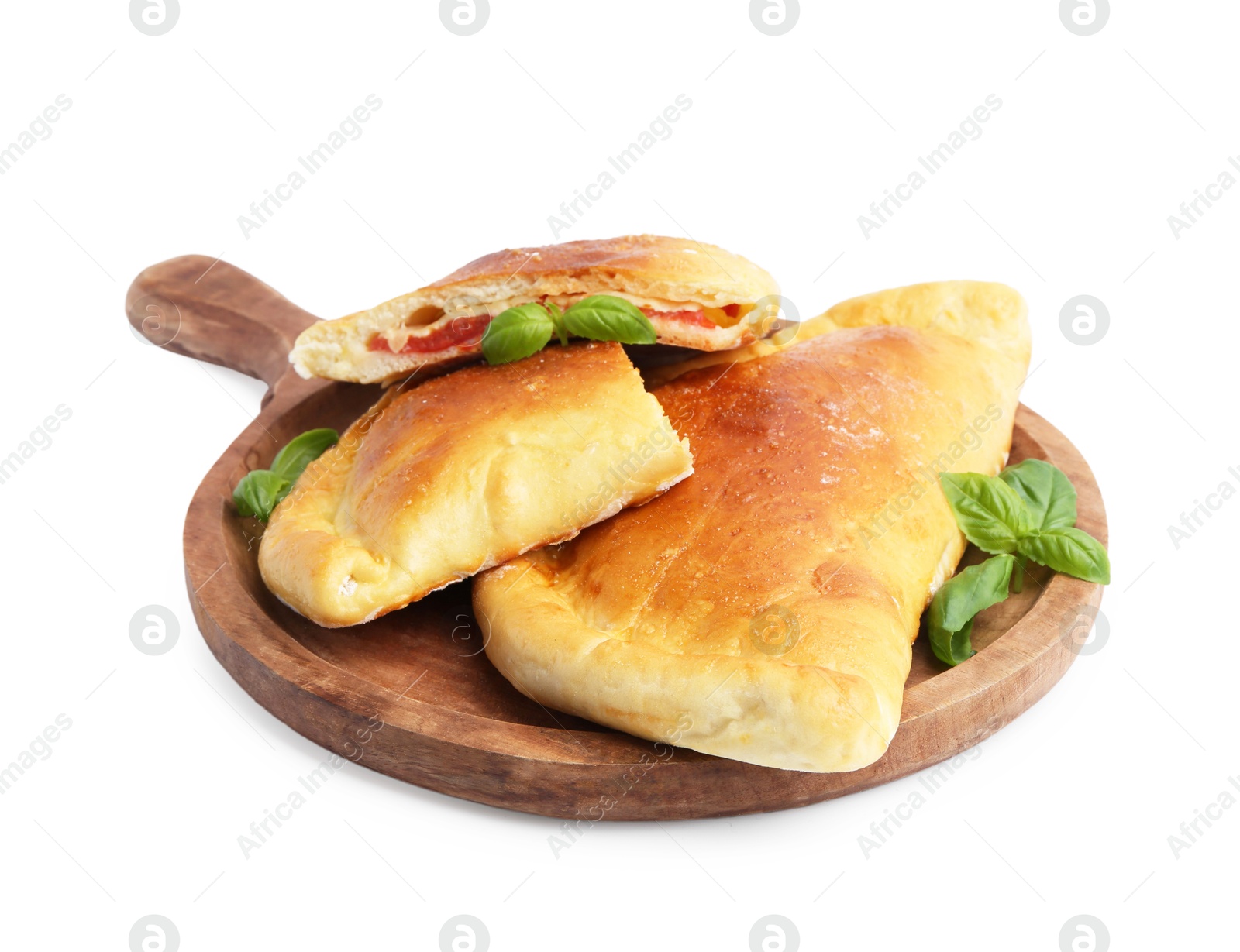 Photo of Tasty vegetarian calzones with tomato, cheese and basil isolated on white