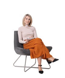 Photo of Professional psychologist with notebook sitting on chair against white background