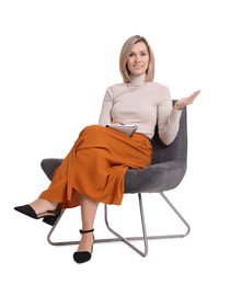 Photo of Professional psychologist with notebook sitting on chair against white background