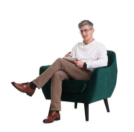 Photo of Professional psychologist with notebook sitting on chair against white background