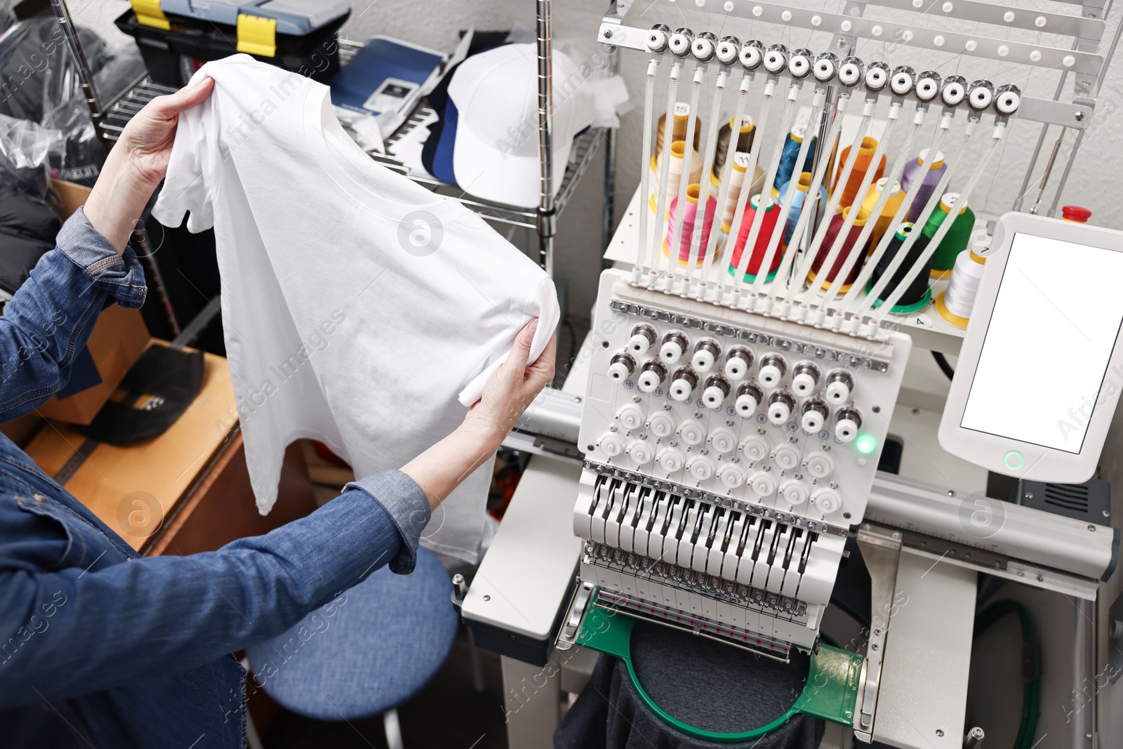 Photo of Woman with blank T-shirt for print indoors, closeup