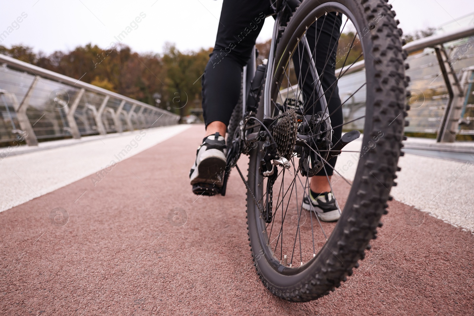 Photo of Man with bicycle outdoors, closeup. Healthy lifestyle