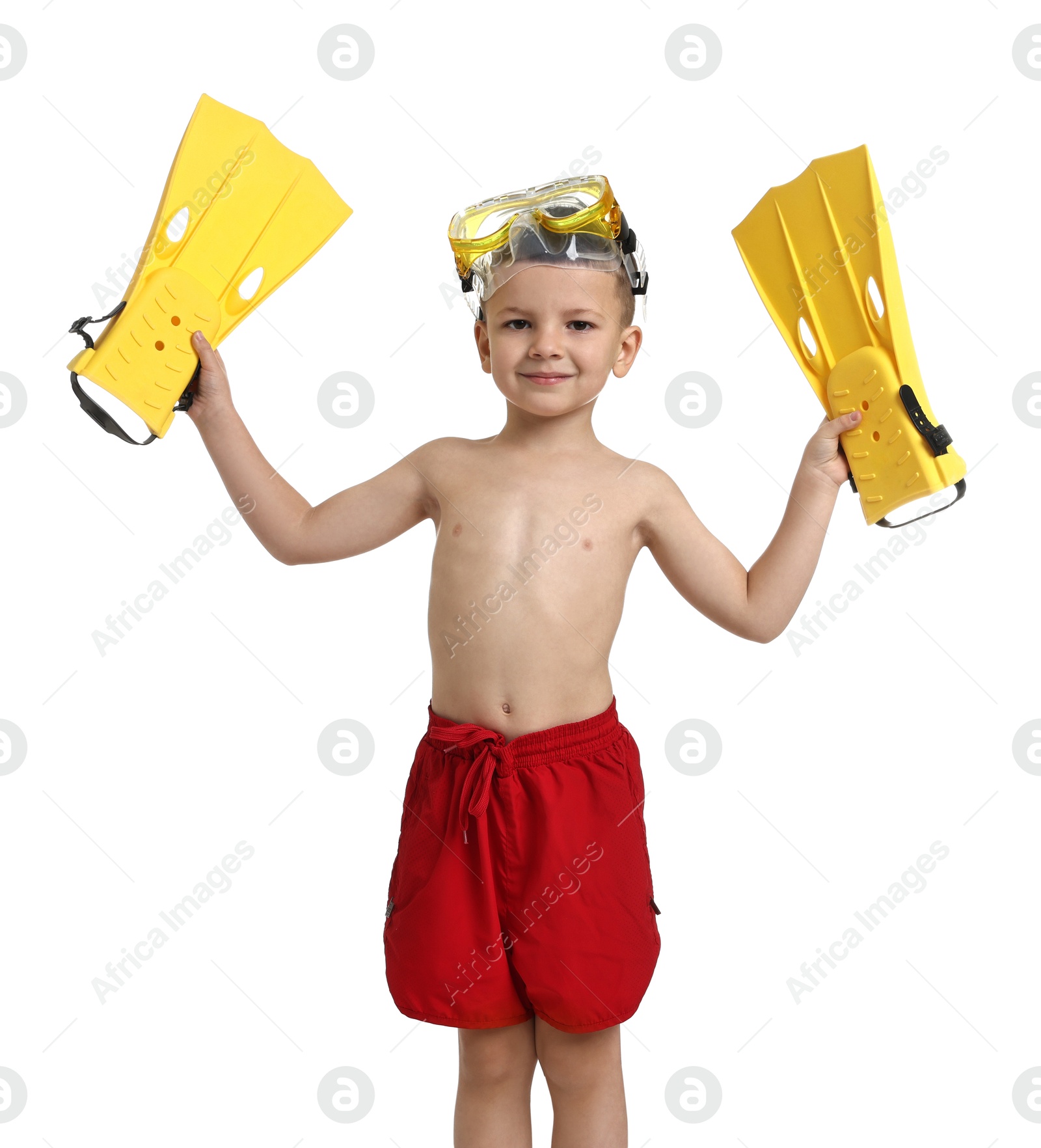 Photo of Cute little boy in beachwear with mask and fins on white background