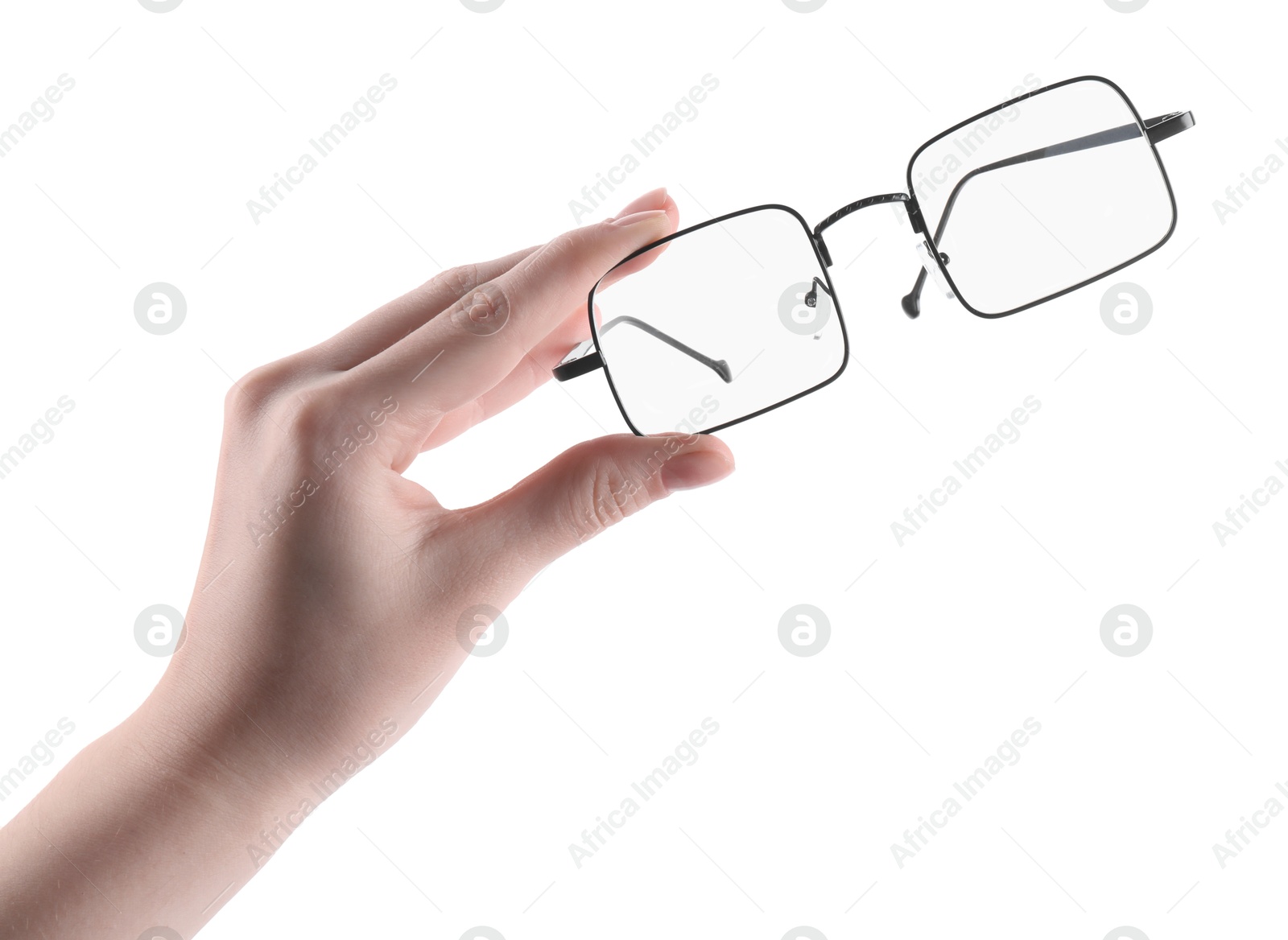 Photo of Woman holding glasses with black metal frame on white background, closeup