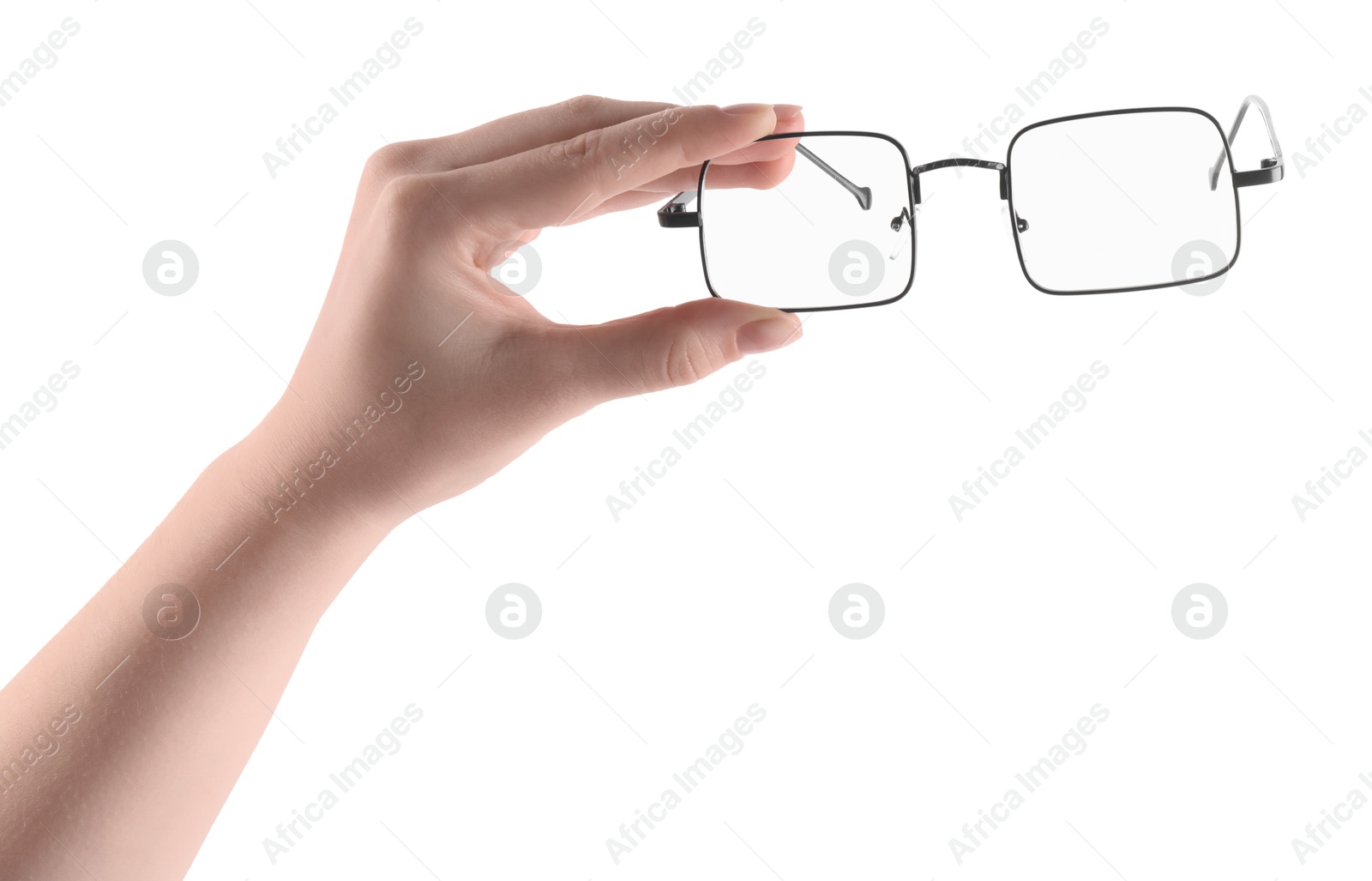 Photo of Woman holding glasses with black metal frame on white background, closeup