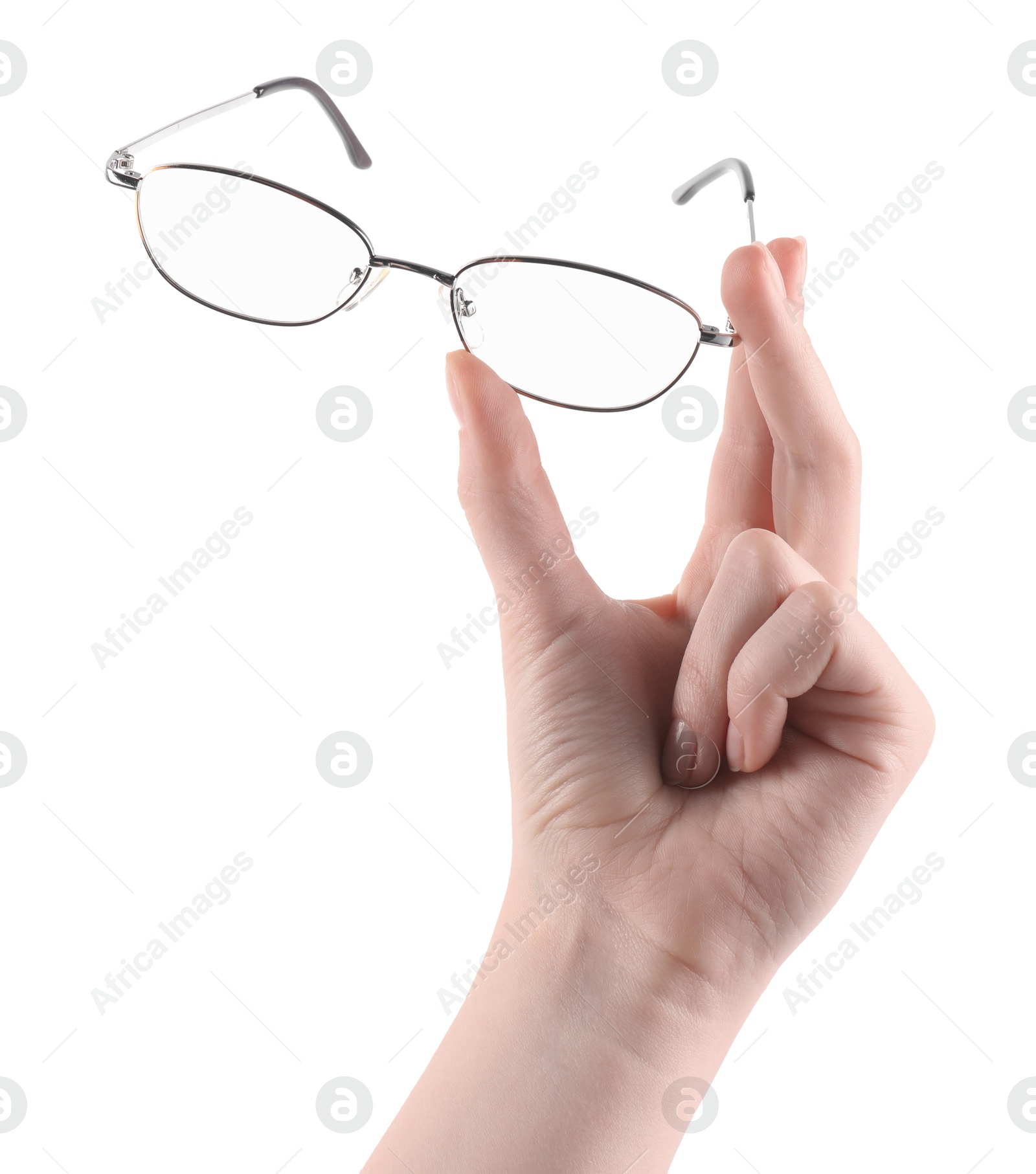 Photo of Woman holding glasses with round metal frame on white background, closeup