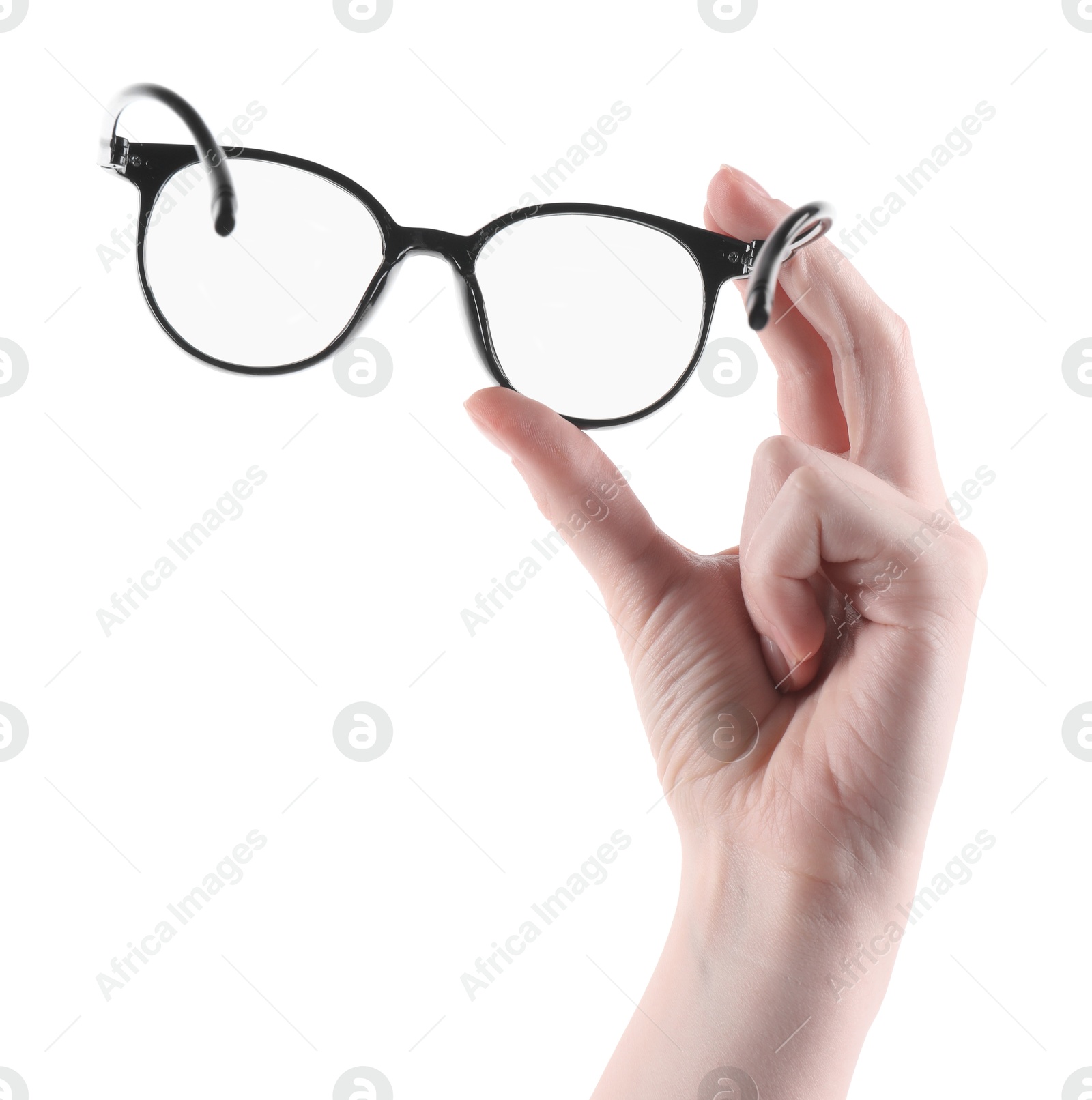 Photo of Woman holding glasses with trendy black frame on white background, closeup