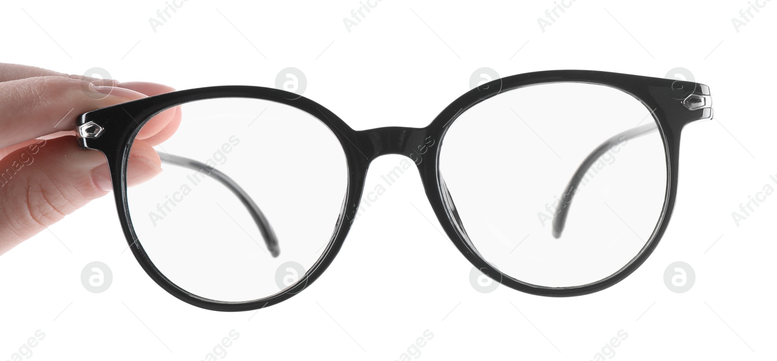 Photo of Woman holding glasses with trendy black frame on white background, closeup