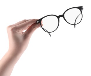 Photo of Woman holding glasses with trendy black frame on white background, closeup