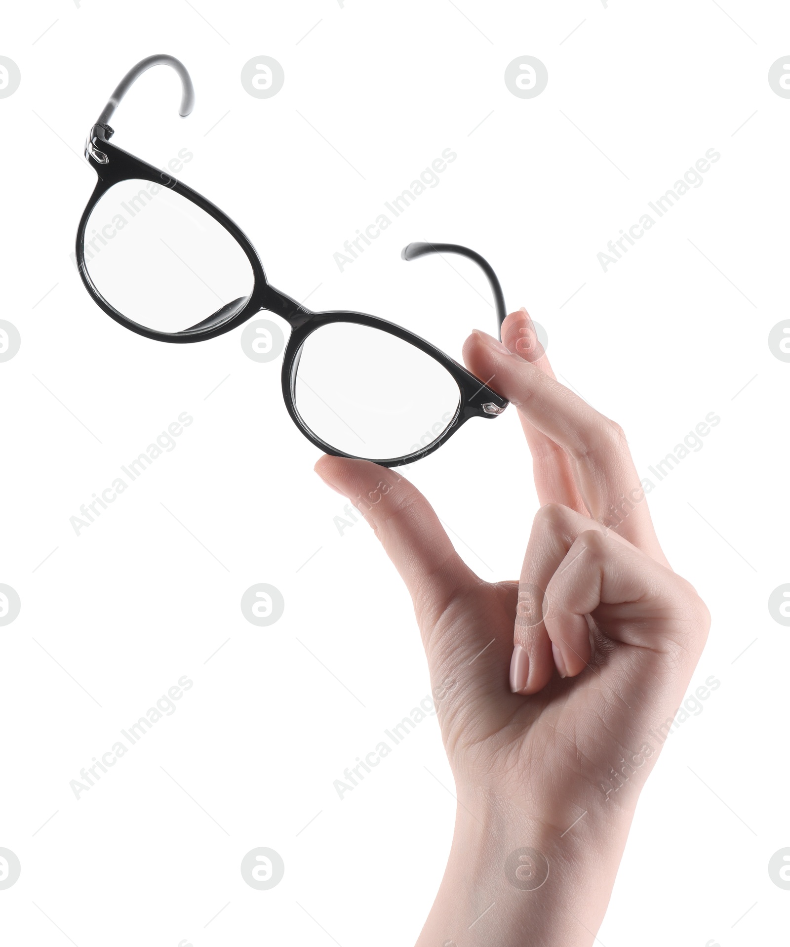 Photo of Woman holding glasses with trendy black frame on white background, closeup