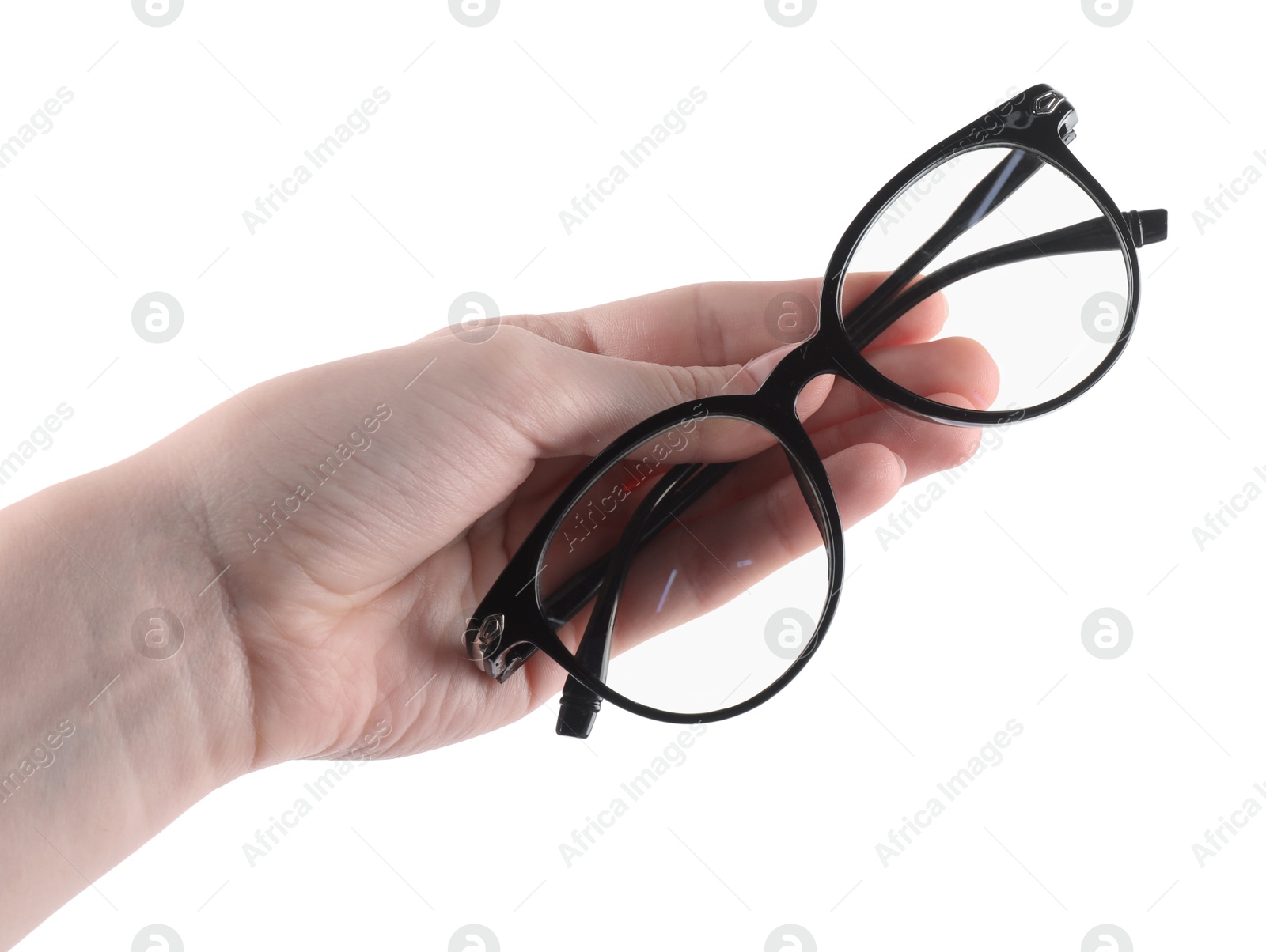 Photo of Woman holding glasses with trendy black frame on white background, closeup