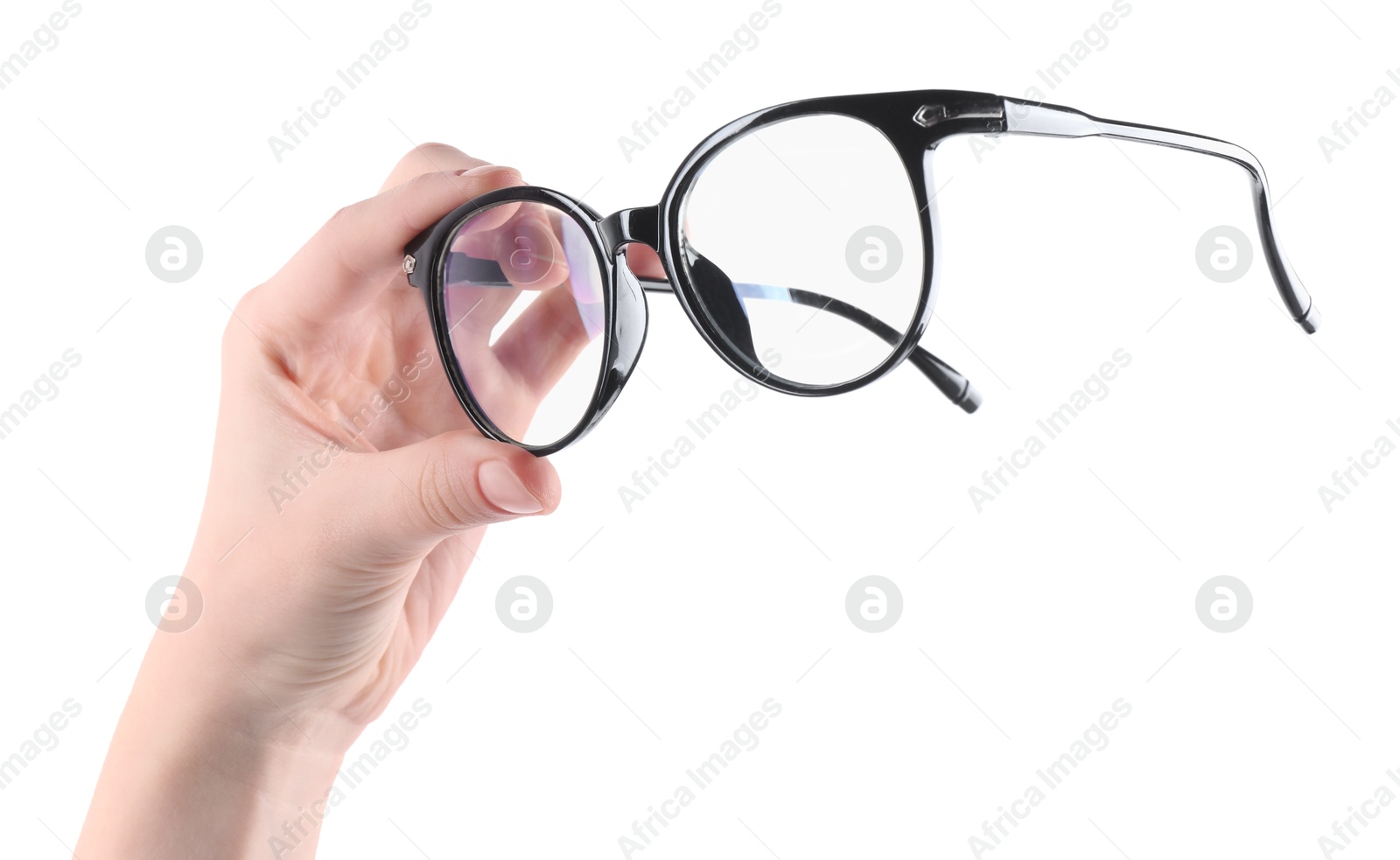 Photo of Woman holding glasses with trendy black frame on white background, closeup