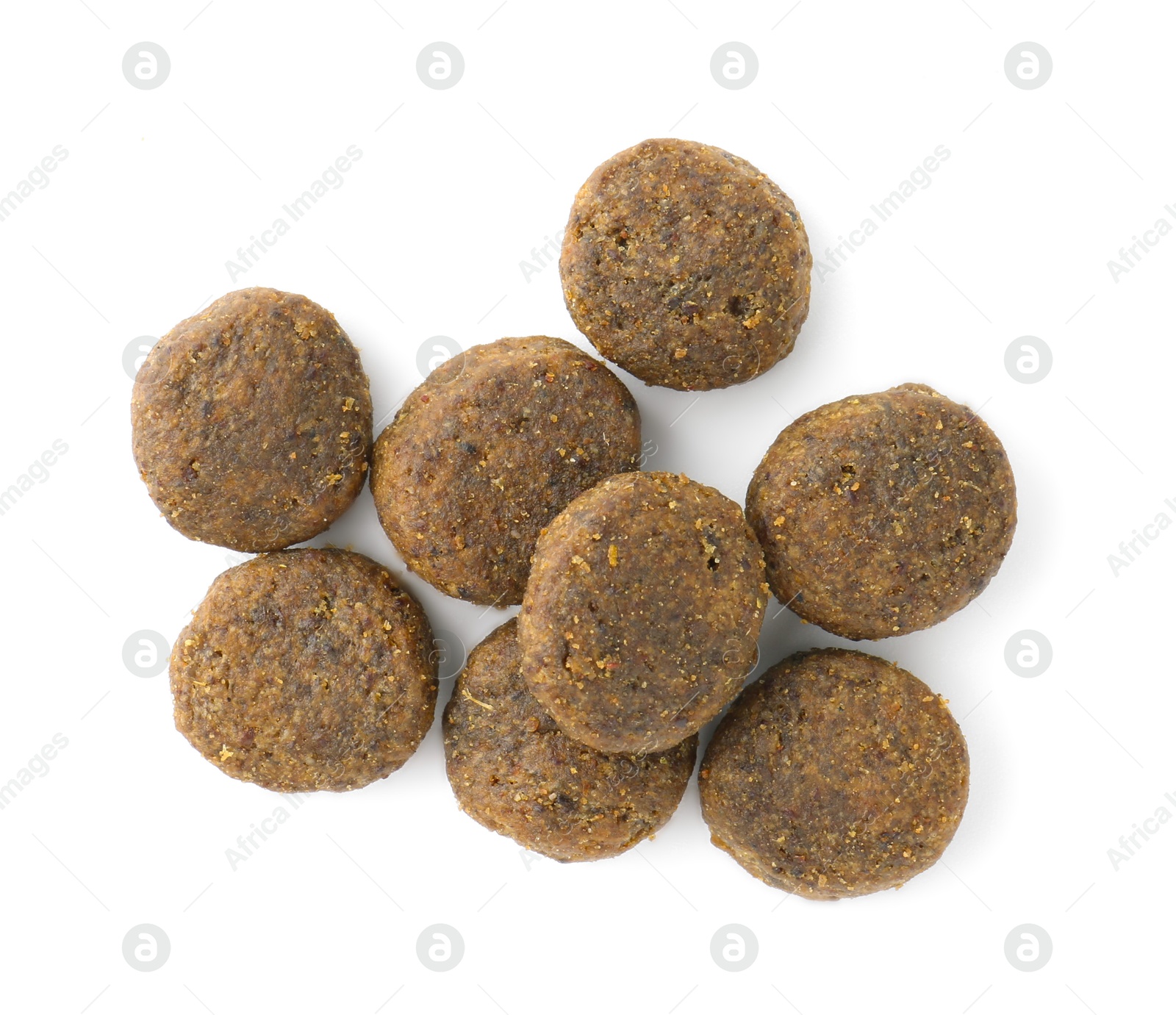 Photo of Dry pet food granules isolated on white, top view