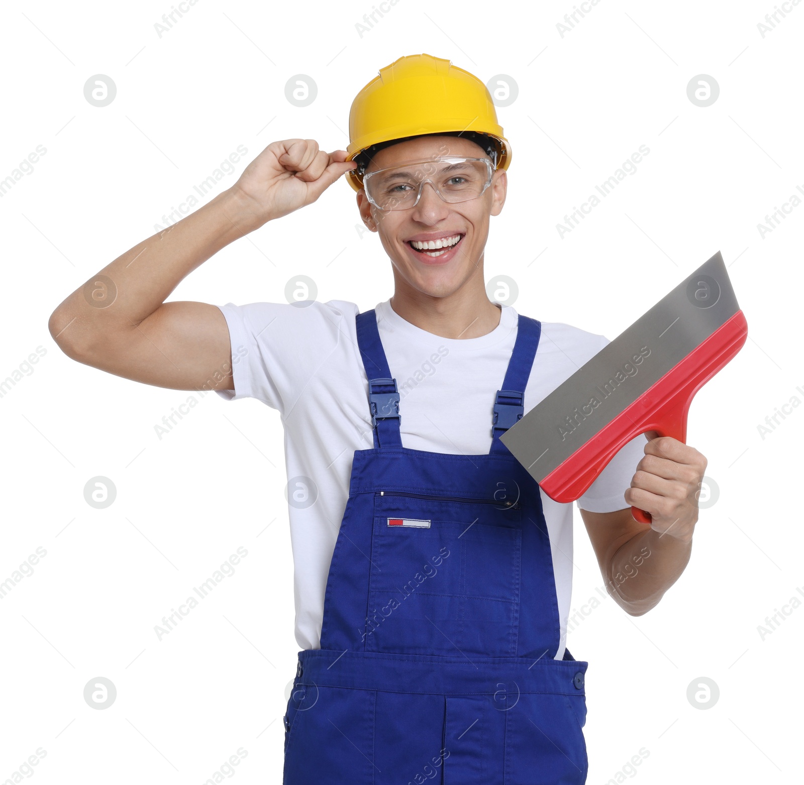 Photo of Portrait of young decorator with putty knife on white background