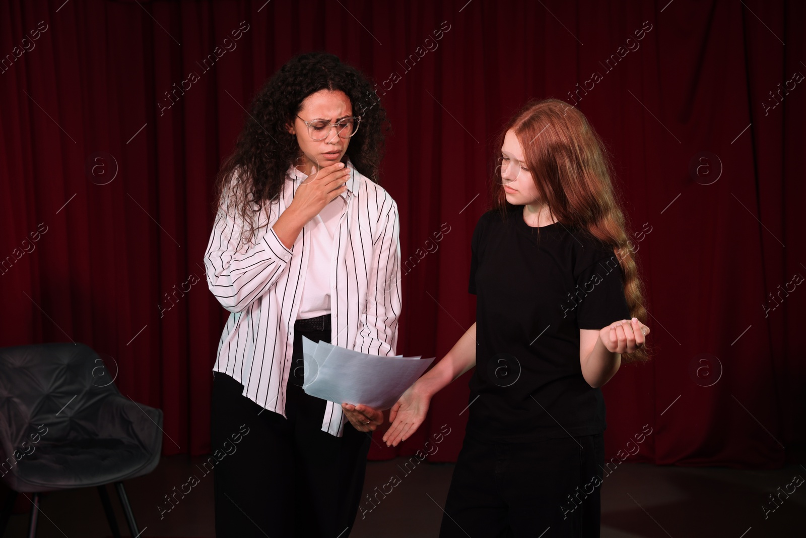 Photo of Professional actors rehearsing on stage in theatre