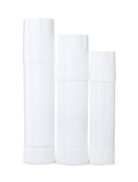 Photo of Many different glue sticks isolated on white