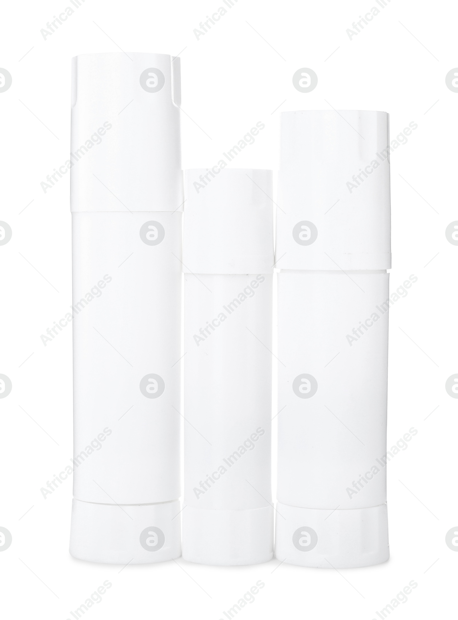 Photo of Many different glue sticks isolated on white