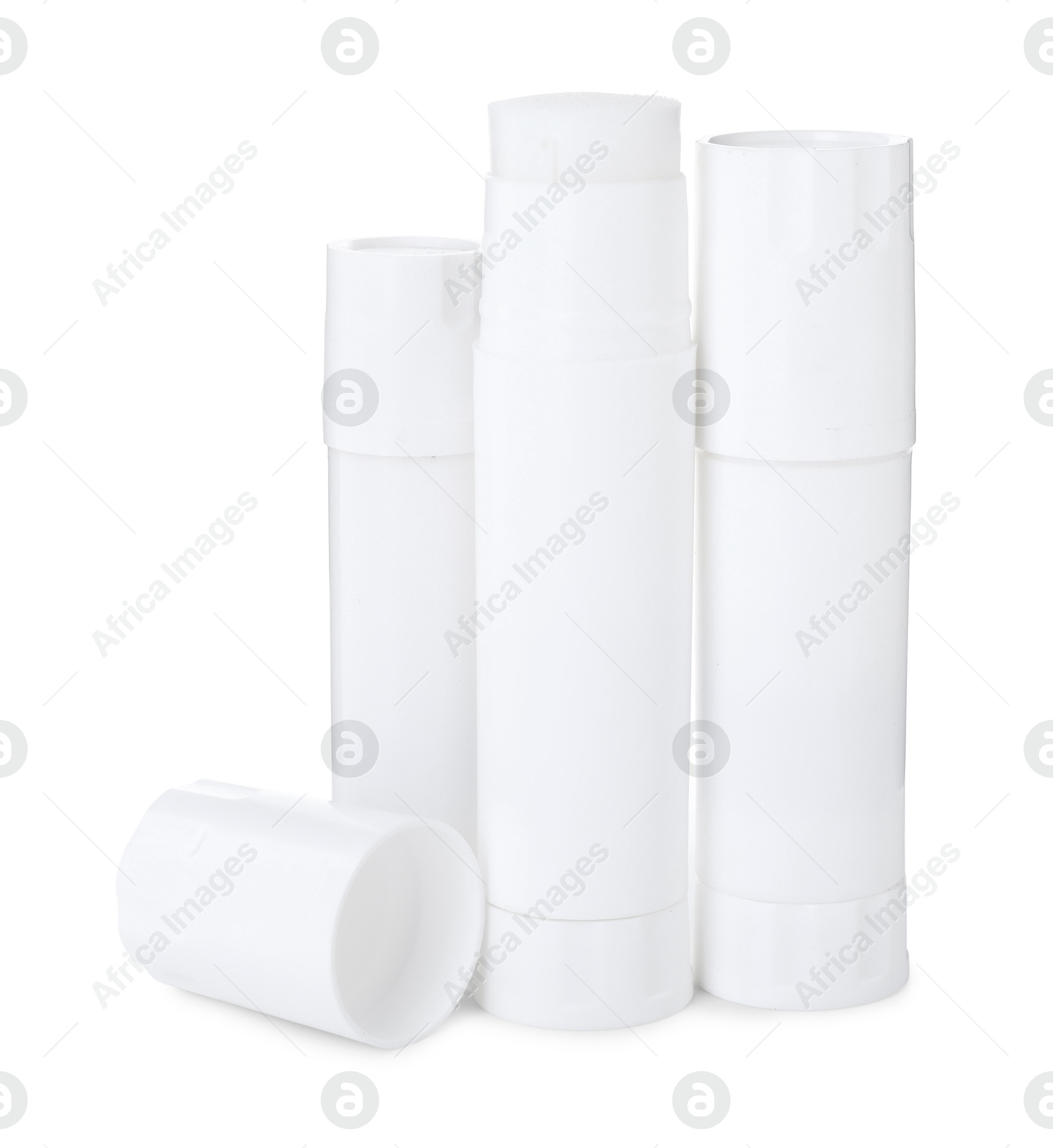 Photo of Many different glue sticks isolated on white