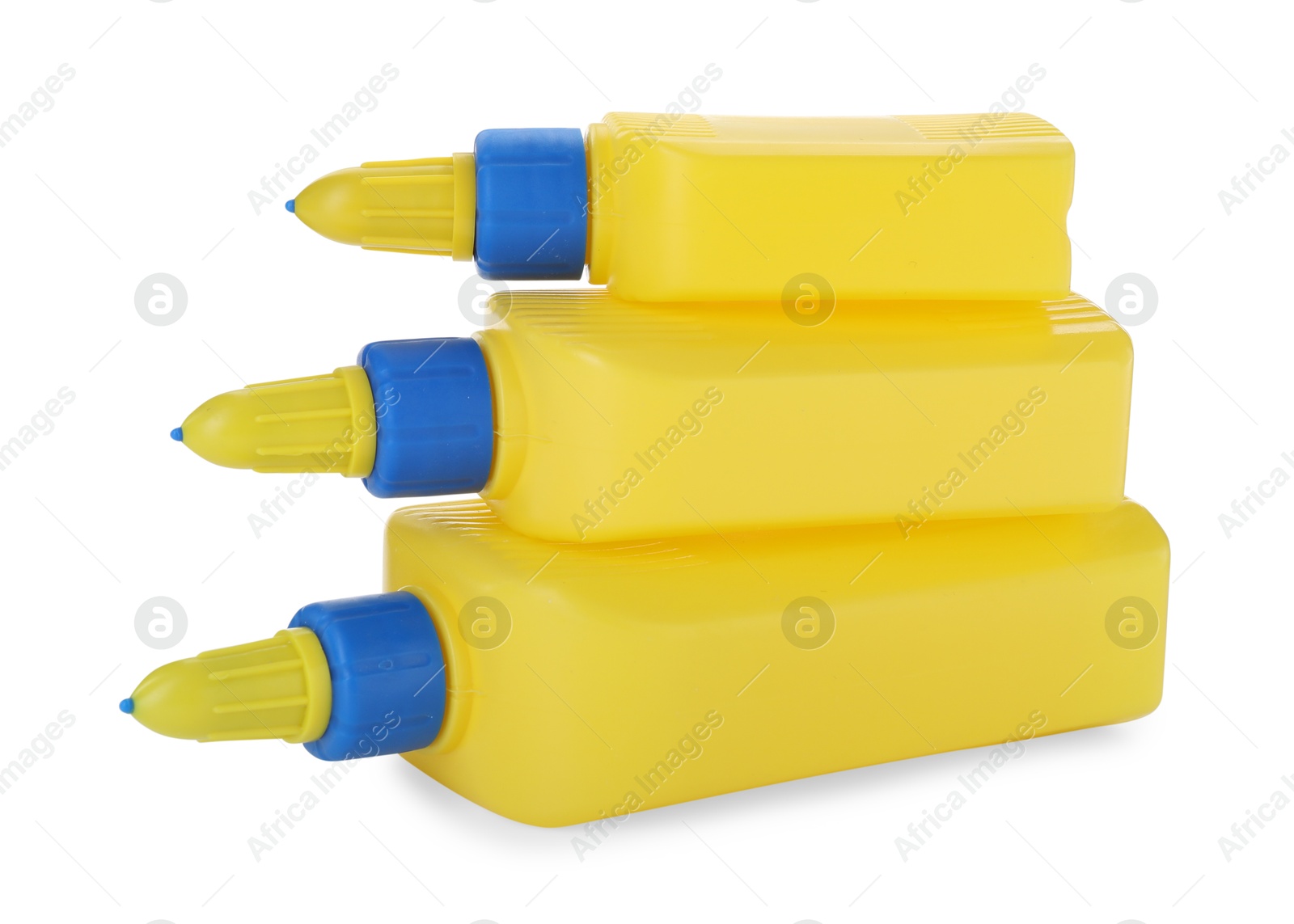 Photo of Stack of glue in bottles isolated on white