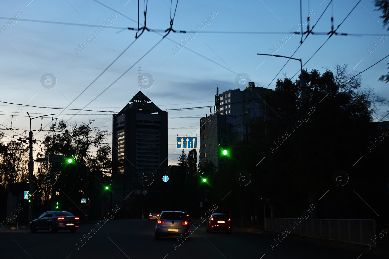 Photo of Cityscape with road traffic and street lights in evening